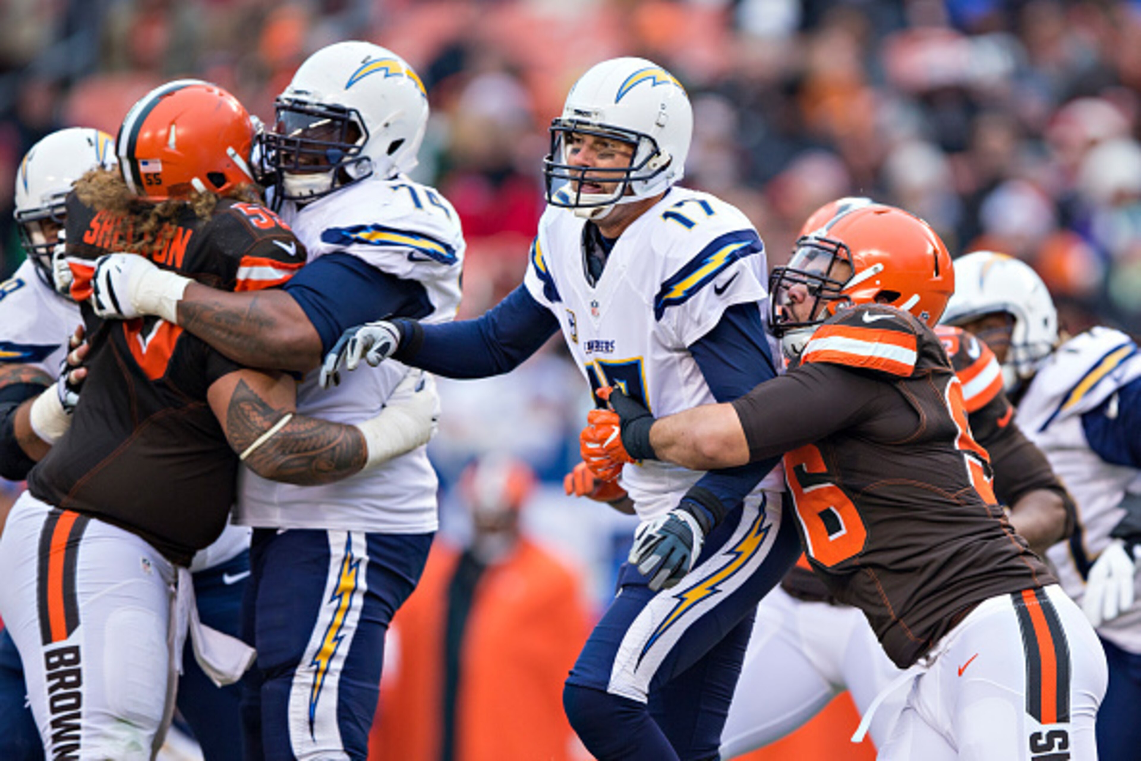 CLEVELAND, OH - DECEMBER 24: Philip Rivers #17 of the San Diego Chargers throws a pass under pressure from Xavier Cooper #96 of the Cleveland Browns at FirstEnergy Stadium on December 24, 2016 in Cleveland, Ohio. The Browns defeated the Chargers 20-17. CLEVELAND, OH - DECEMBER 24: Philip Rivers #17 of the San Diego Chargers throws a pass under pressure from Xavier Cooper #96 of the Cleveland Browns at FirstEnergy Stadium on December 24, 2016 in Cleveland, Ohio. The Browns defeated the Chargers 20-17.