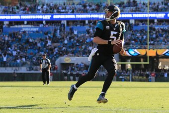 JACKSONVILLE, FL - DECEMBER 24: Blake Bortles #5 of the Jacksonville Jaguars carries for a touchdown off a pass from Marquise Lee, not pictured, during the fourth quarter of the game against the Tennessee Titans at EverBank Field on December 24, 2016 in J