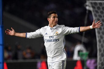 YOKOHAMA, JAPAN - DECEMBER 18:  Cristiano Ronaldo of Real Madrid celebrates scoring his team's second goal during the FIFA Club World Cup final match between Real Madrid and Kashima Antlers at International Stadium Yokohama on December 18, 2016 in Yokoham