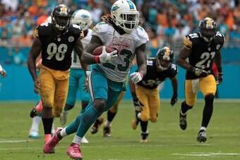 MIAMI GARDENS, FL - OCTOBER 16:  Jay Ajayi #23 of the Miami Dolphins rushes during a game against the Pittsburgh Steelers on October 16, 2016 in Miami Gardens, Florida.  (Photo by Mike Ehrmann/Getty Images)