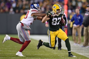 GREEN BAY, WI - OCTOBER 09:  Jordy Nelson #87 of the Green Bay Packers is pursued by Andrew Adams #33 of the New York Giants during a game at Lambeau Field on October 9, 2016 in Green Bay, Wisconsin. The Packers defeated the Giants 23-16.  (Photo by Stacy