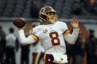 Kirk Cousins #8 of the Washington Redskins warms up during pre game at Soldier Field on December 24, 2016 in Chicago, Illinois. (Photo by David Banks/Getty Images)