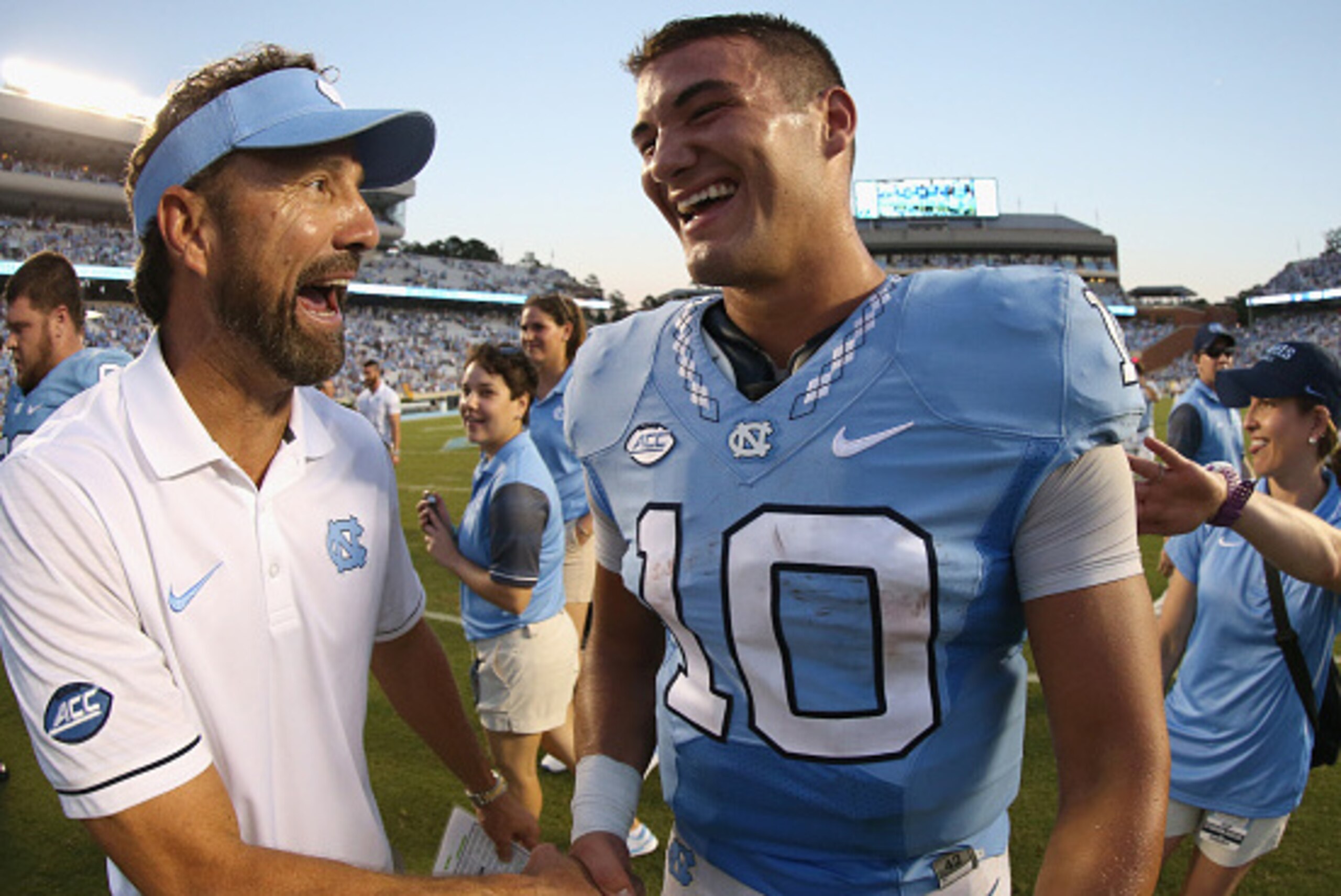 CHAPEL HILL, NC - SEPTEMBER 24:  Head coach Larry Fedora of the North Carolina Tar Heels congratulates Mitch Trubisky #10 of the North Carolina Tar Heels after defeating the Pittsburgh Panthers 37-36 at Kenan Stadium on September 24, 2016 in Chapel Hill, 