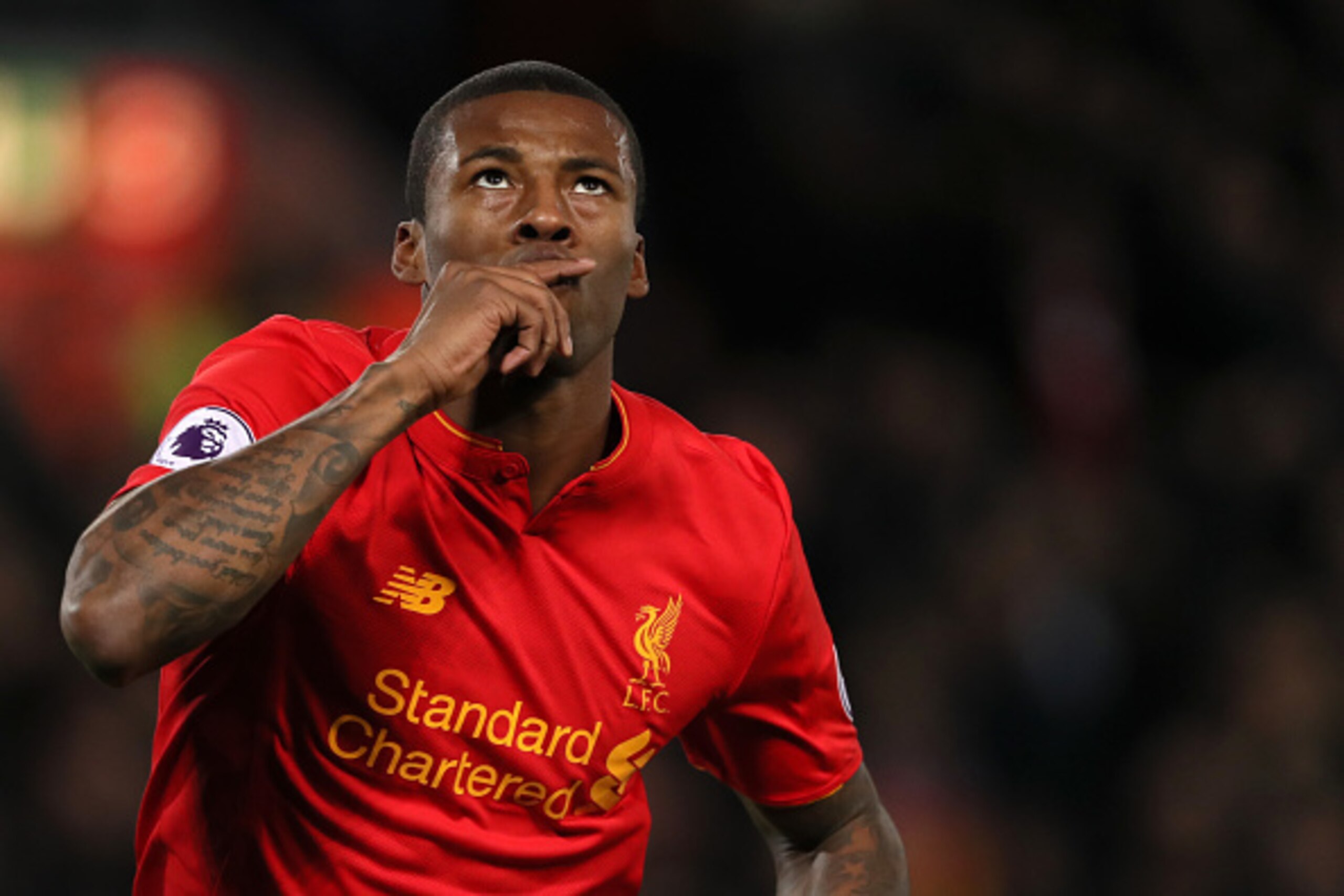 LIVERPOOL, ENGLAND - DECEMBER 31: Georginio Wijnaldum of Liverpool celebrates after scoring a goal to make it 1-0 during the Premier League match between Liverpool and Manchester City at Anfield on December 31, 2016 in Liverpool, England. (Photo by Matthe