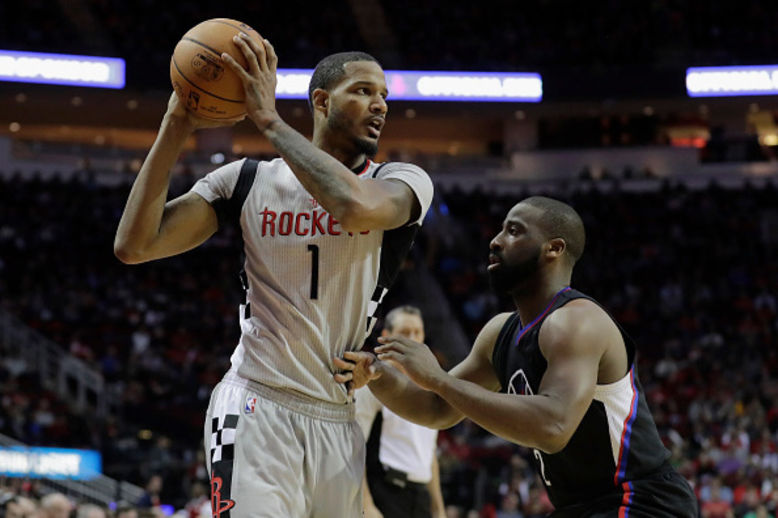 HOUSTON, TX - DECEMBER 30:  Trevor Ariza #1 of the Houston Rockets controls  the ball defended by Raymond Felton #2 of the LA Clippers in the first half at Toyota Center on December 30, 2016 in Houston, Texas. NOTE TO USER: User expressly acknowledges and