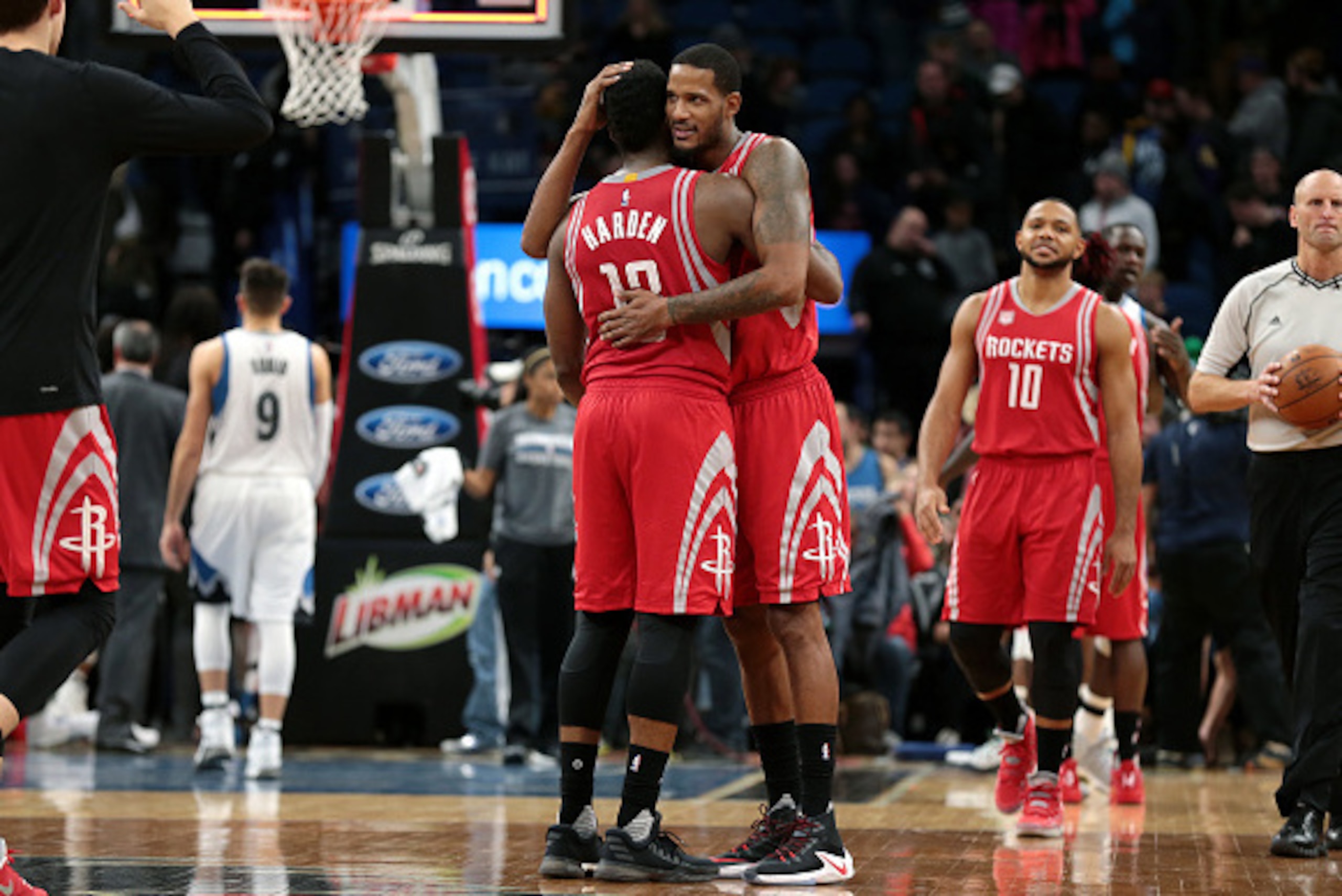 MINNEAPOLIS, MN -  DECEMBER 17: Trevor Ariza #1 and James Harden #13 of the Houston Rockets share a hug after the game against the Minnesota Timberwolves on December 17, 2016 at Target Center in Minneapolis, Minnesota. NOTE TO USER: User expressly acknowl