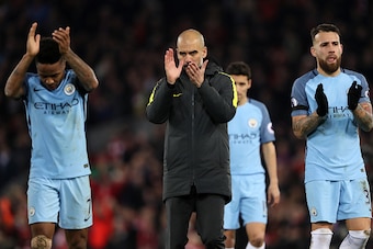 LIVERPOOL, ENGLAND - DECEMBER 31: Josep Guardiola the head coach / manager of Manchester City applauds the fans after losing in the Premier League match between Liverpool and Manchester City at Anfield on December 31, 2016 in Liverpool, England. (Photo by