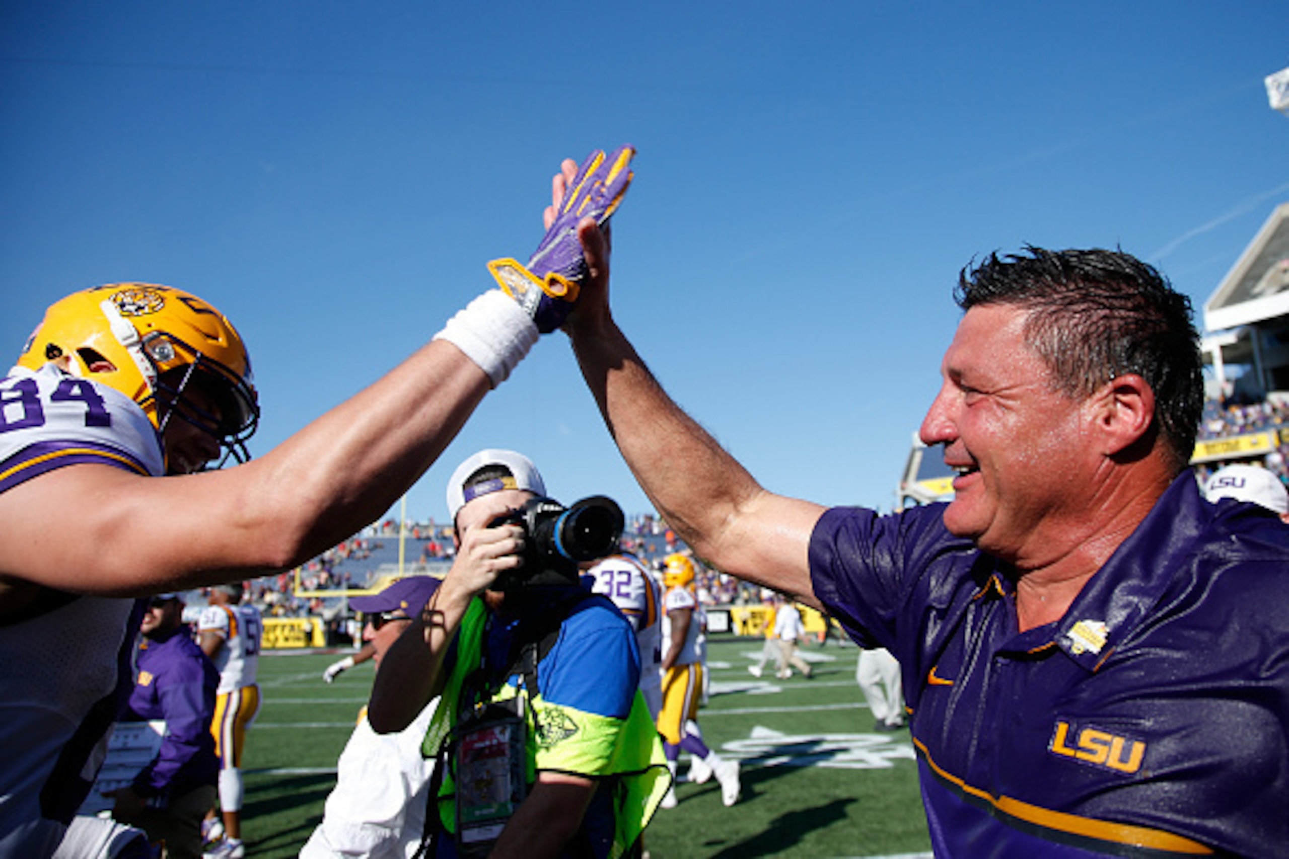 ORLANDO, FL - DECEMBER 31: Head coach Ed Orgeron of the LSU Tigers players celebrates after defeating the Louisville Cardinals 29-9 in the Buffalo Wild Wings Citrus Bowl at Camping World Stadium on December 31, 2016 in Orlando, Florida. (Photo by Joe Robb