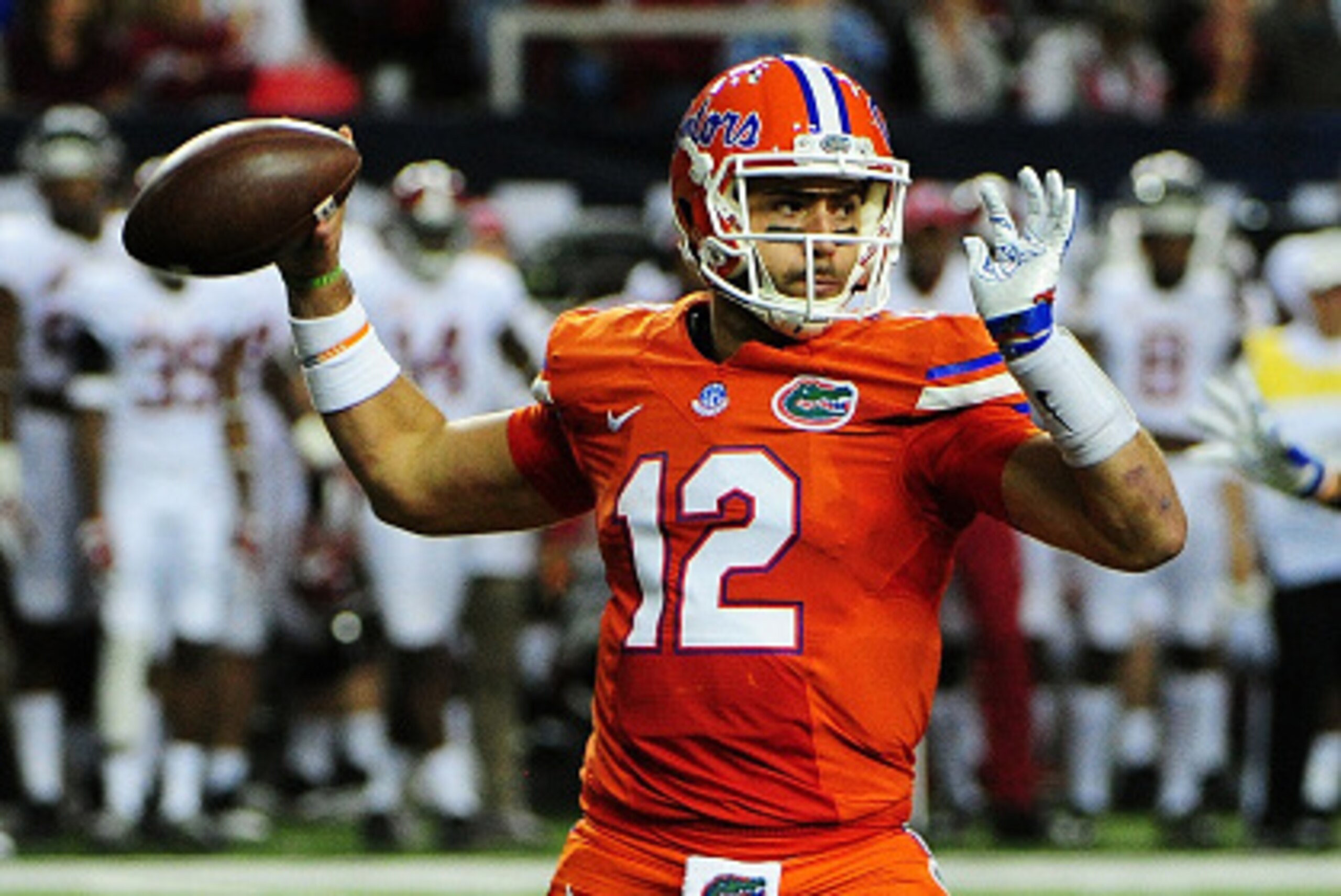 ATLANTA, GA - DECEMBER 03:  Austin Appleby #12 of the Florida Gators looks to pass in the first half against the Alabama Crimson Tide during the SEC Championship game at the Georgia Dome on December 3, 2016 in Atlanta, Georgia.  (Photo by Scott Cunningham