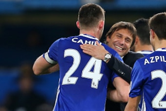 LONDON, ENGLAND - DECEMBER 31: Antonio Conte manager / head coach of Chelsea celebrates the win with Gary Cahill and Cesar Azpilicueta of Chelsea during the Premier League match between Chelsea and Stoke City at Stamford Bridge on December 31, 2016 in Lon