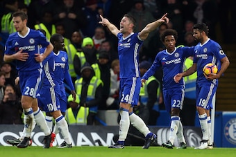 LONDON, ENGLAND - DECEMBER 31: Gary Cahill of Chelsea celebrates after scoring to make it 1-0 during the Premier League match between Chelsea and Stoke City at Stamford Bridge on December 31, 2016 in London, England. (Photo by Catherine Ivill - AMA/Getty 