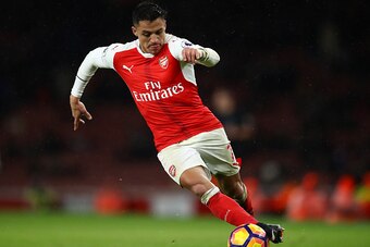 LONDON, ENGLAND - JANUARY 01:  Alexis Sanchez of Arsenal runs with the ball during the Premier League match between Arsenal and Crystal Palace at the Emirates Stadium on January 1, 2017 in London, England.  (Photo by Clive Mason/Getty Images)