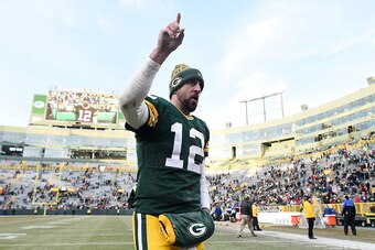 GREEN BAY, WI - DECEMBER 24:  Aaron Rodgers #12 of the Green Bay Packers leaves the field following a victory over the Minnesota Vikings at Lambeau Field on December 24, 2016 in Green Bay, Wisconsin.  Green Bay defeated the Vikings 38-25.  (Photo by Stacy