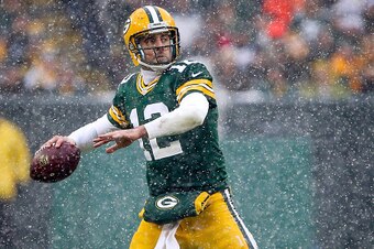 GREEN BAY, WI - DECEMBER 04:  Aaron Rodgers #12 of the Green Bay Packers throws a pass in the fourth quarter against the Houston Texans at Lambeau Field on December 4, 2016 in Green Bay, Wisconsin. (Photo by Dylan Buell/Getty Images)
