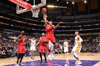 LOS ANGELES, CA - JANUARY 1: Kyle Lowry #7 of the Toronto Raptors shoots the ball against the Los Angeles Lakers on January 1, 2017 at STAPLES Center in Los Angeles, California. NOTE TO USER: User expressly acknowledges and agrees that, by downloading and