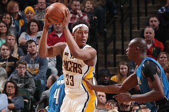 INDIANAPOLIS, IN - JANUARY 1:  Myles Turner #33 of the Indiana Pacers handles the ball during a game against the Orlando Magic on January 1, 2017 at Bankers Life Fieldhouse in Indianapolis, Indiana. NOTE TO USER: User expressly acknowledges and agrees tha