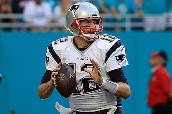 MIAMI GARDENS, FL - JANUARY 01:  Tom Brady #12 of the New England Patriots passes during a game against the Miami Dolphins at Hard Rock Stadium on January 1, 2017 in Miami Gardens, Florida.  (Photo by Mike Ehrmann/Getty Images)
