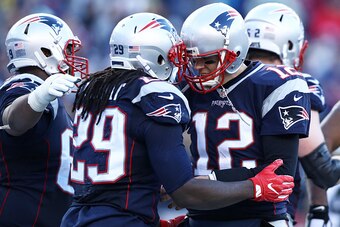 FOXBORO, MA - DECEMBER 24: LeGarrette Blount #29 of the New England Patriots celebrates with Tom Brady #12 after scoring against the New York Jets during the second half at Gillette Stadium on December 24, 2016 in Foxboro, Massachusetts. (Photo by Maddie 