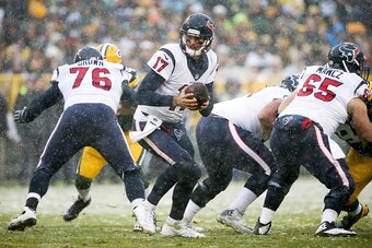 GREEN BAY, WI - DECEMBER 04:  Brock Osweiler #17 of the Houston Texans takes the snap in the third quarter against the Green Bay Packers at Lambeau Field on December 4, 2016 in Green Bay, Wisconsin. (Photo by Dylan Buell/Getty Images)