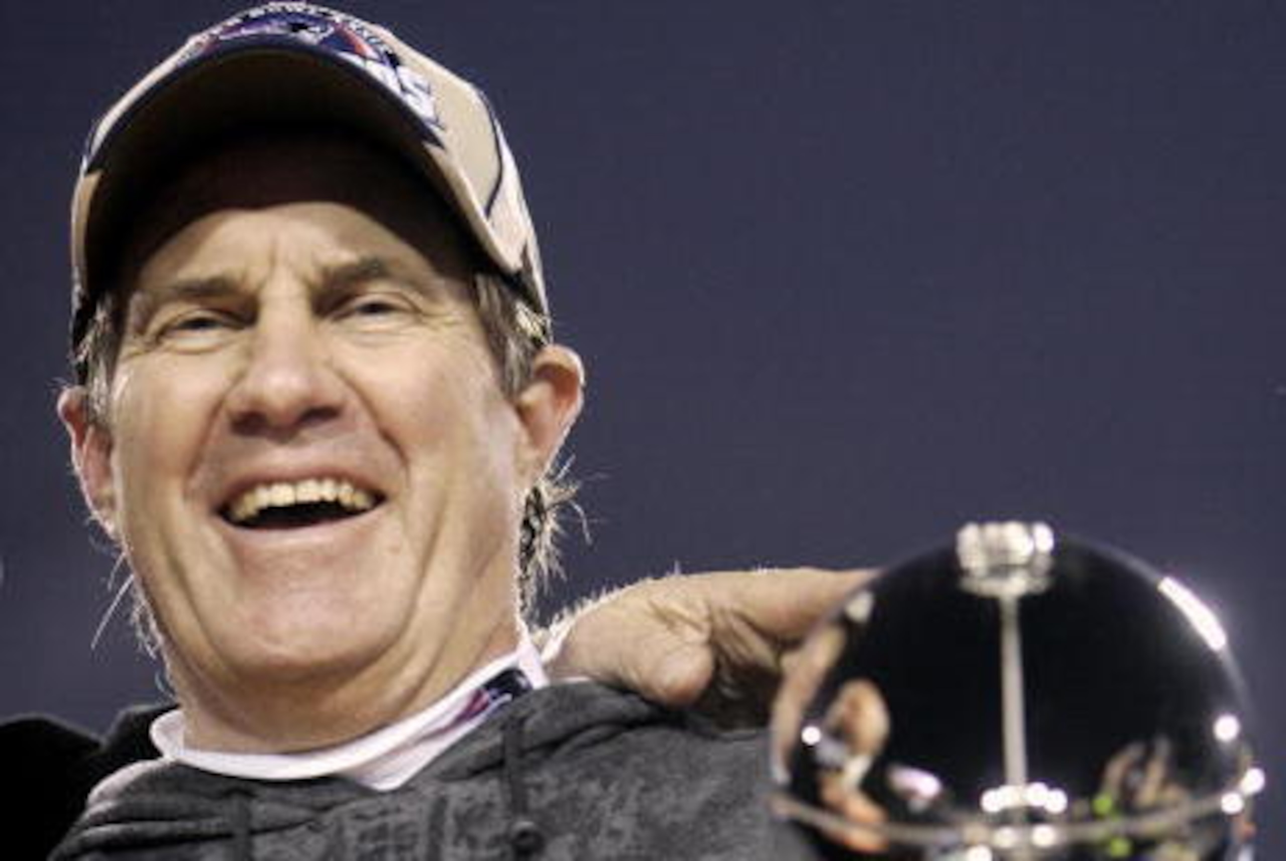 JACKSONVILLE, UNITED STATES:  Head coach Bill Belichick of the New England Patriots holds the Vince Lombardi trophy 06 February 2005 after winning Super Bowl XXXIX at Alltel Stadium in Jacksonville, Florida. The Patriots defeated the Philadelphia Eagles 2