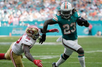 Jay Ajayi will look to keep carrying the Dolphins in the playoffs.
