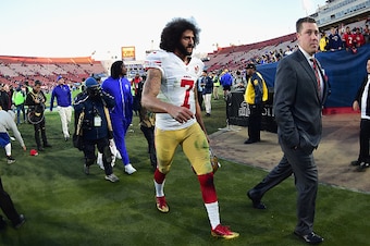 LOS ANGELES, CA - DECEMBER 24:  Colin Kaepernick #7 of the San Francisco 49ers walks off the field after defeating the Los Angeles Rams 22-21 at Los Angeles Memorial Coliseum on December 24, 2016 in Los Angeles, California.  (Photo by Harry How/Getty Imag