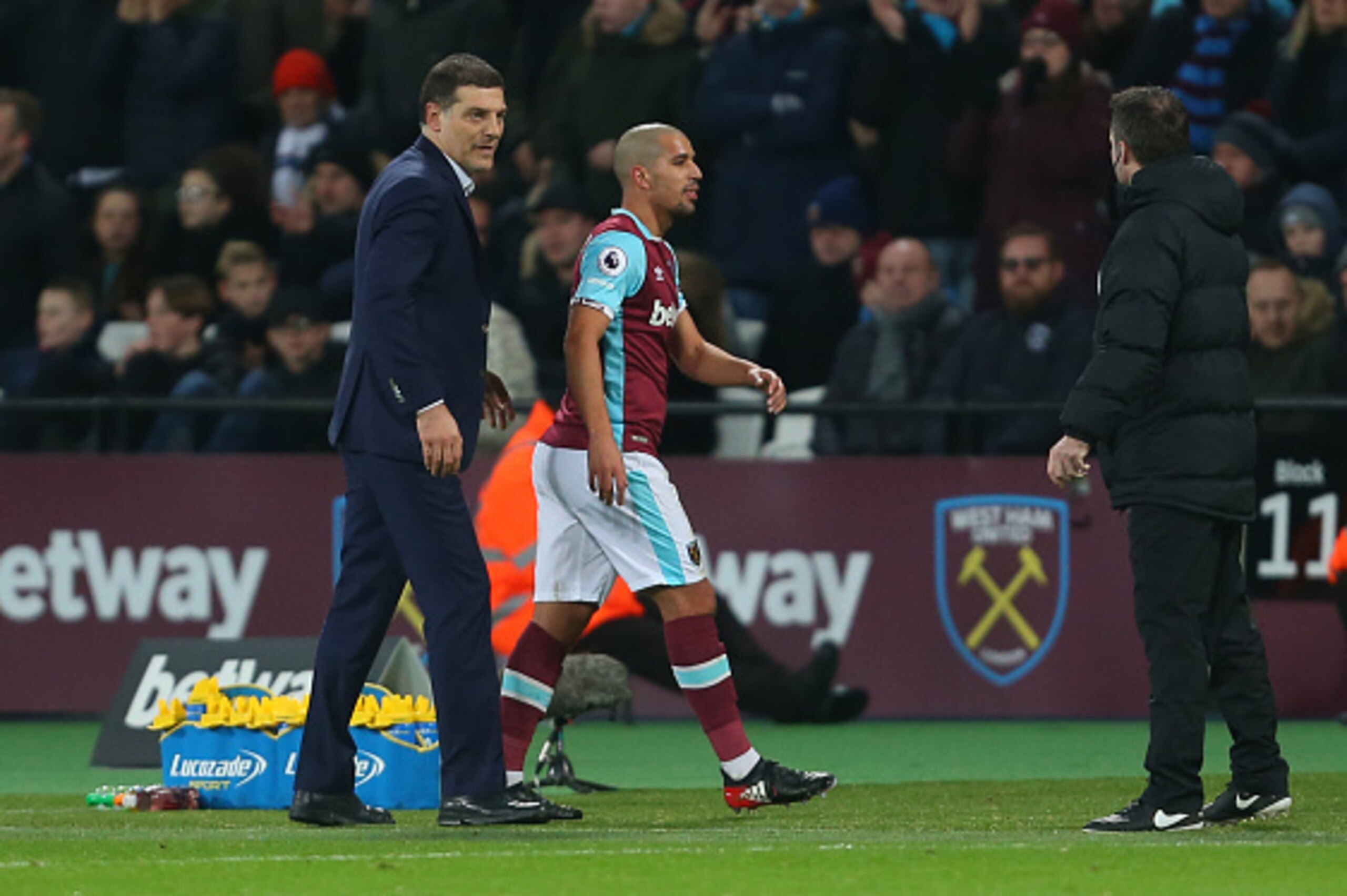 STRATFORD, ENGLAND - JANUARY 02: Slaven Bilic Manager / head coach of West Ham United looks over to the fourth official as Sofiane Feghouli of West Ham walks past having been sent off during the Premier League match between West Ham United and Manchester STRATFORD, ENGLAND - JANUARY 02: Slaven Bilic Manager / head coach of West Ham United looks over to the fourth official as Sofiane Feghouli of West Ham walks past having been sent off during the Premier League match between West Ham United and Manchester