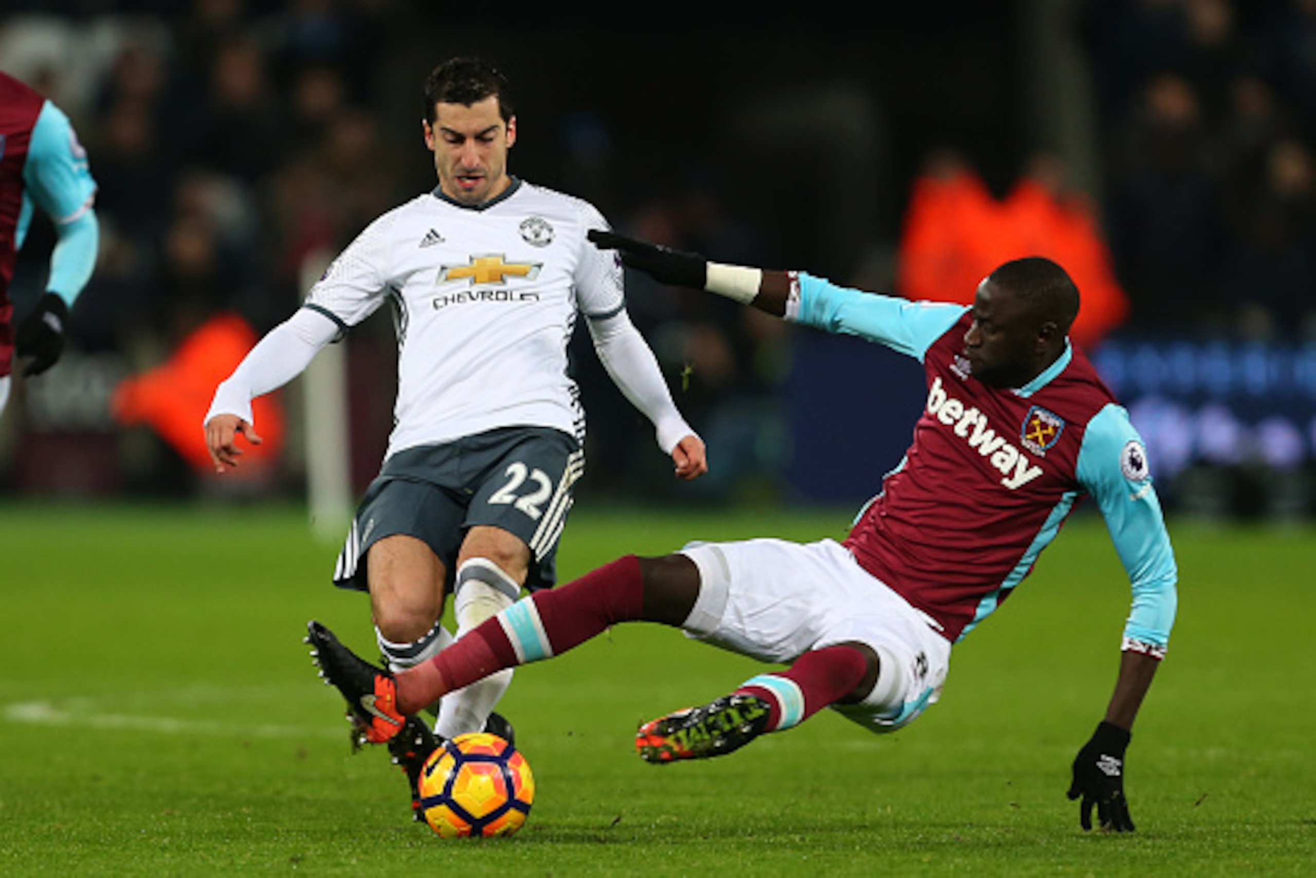 STRATFORD, ENGLAND - JANUARY 02: Cheikhou Kouyate of West Ham tackles Henrikh Mkhitaryan of Manchester United during the Premier League match between West Ham United and Manchester United at London Stadium on January 2, 2017 in Stratford, England. (Photo STRATFORD, ENGLAND - JANUARY 02: Cheikhou Kouyate of West Ham tackles Henrikh Mkhitaryan of Manchester United during the Premier League match between West Ham United and Manchester United at London Stadium on January 2, 2017 in Stratford, England. (Photo