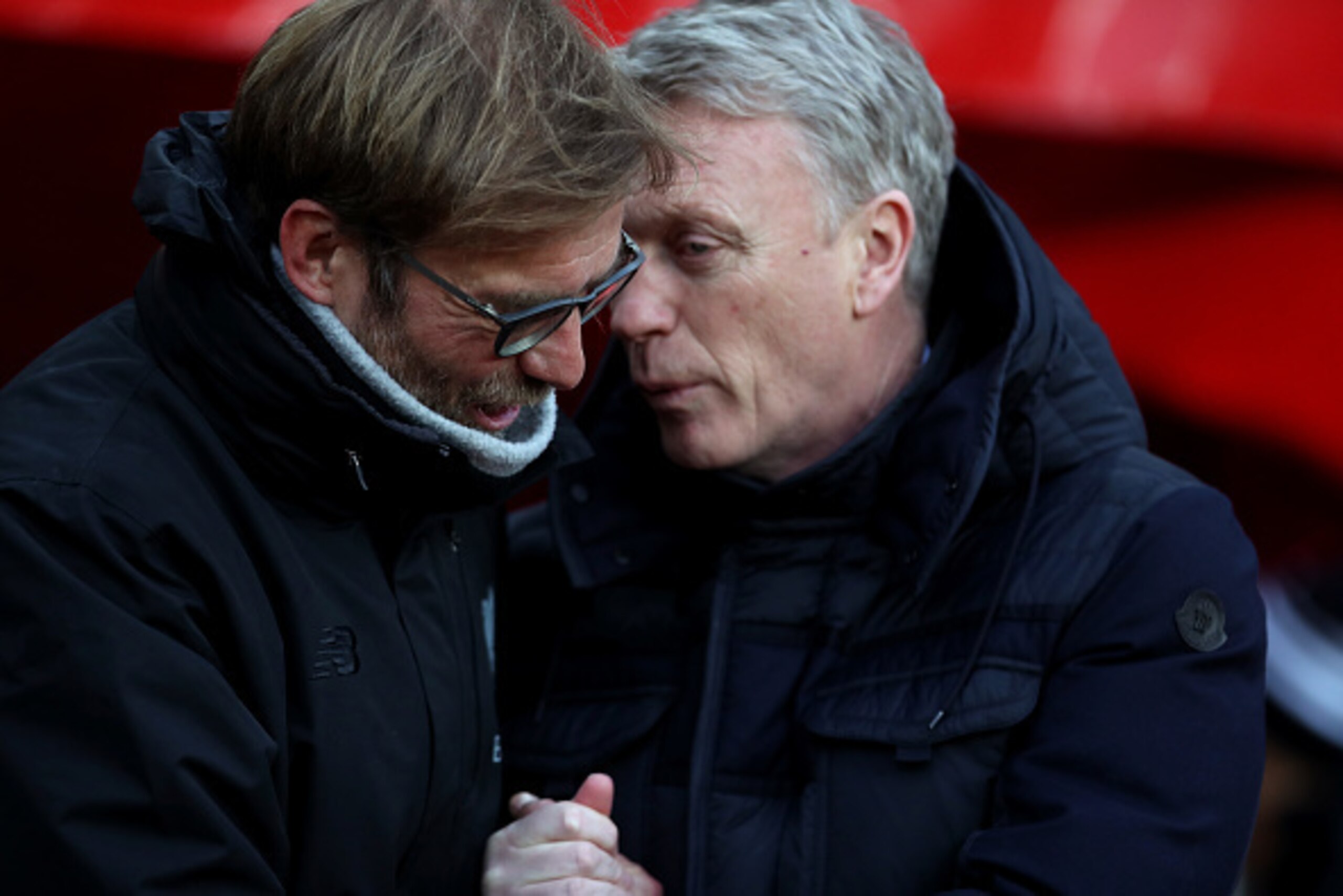 SUNDERLAND, ENGLAND - JANUARY 02: Jurgen Klopp, Manager of Liverpool (L) and David Moyes, Manager of Sunderland (R) embrace prior to kick off, before the Premier League match between Sunderland and Liverpool at Stadium of Light on January 2, 2017 in Sunde