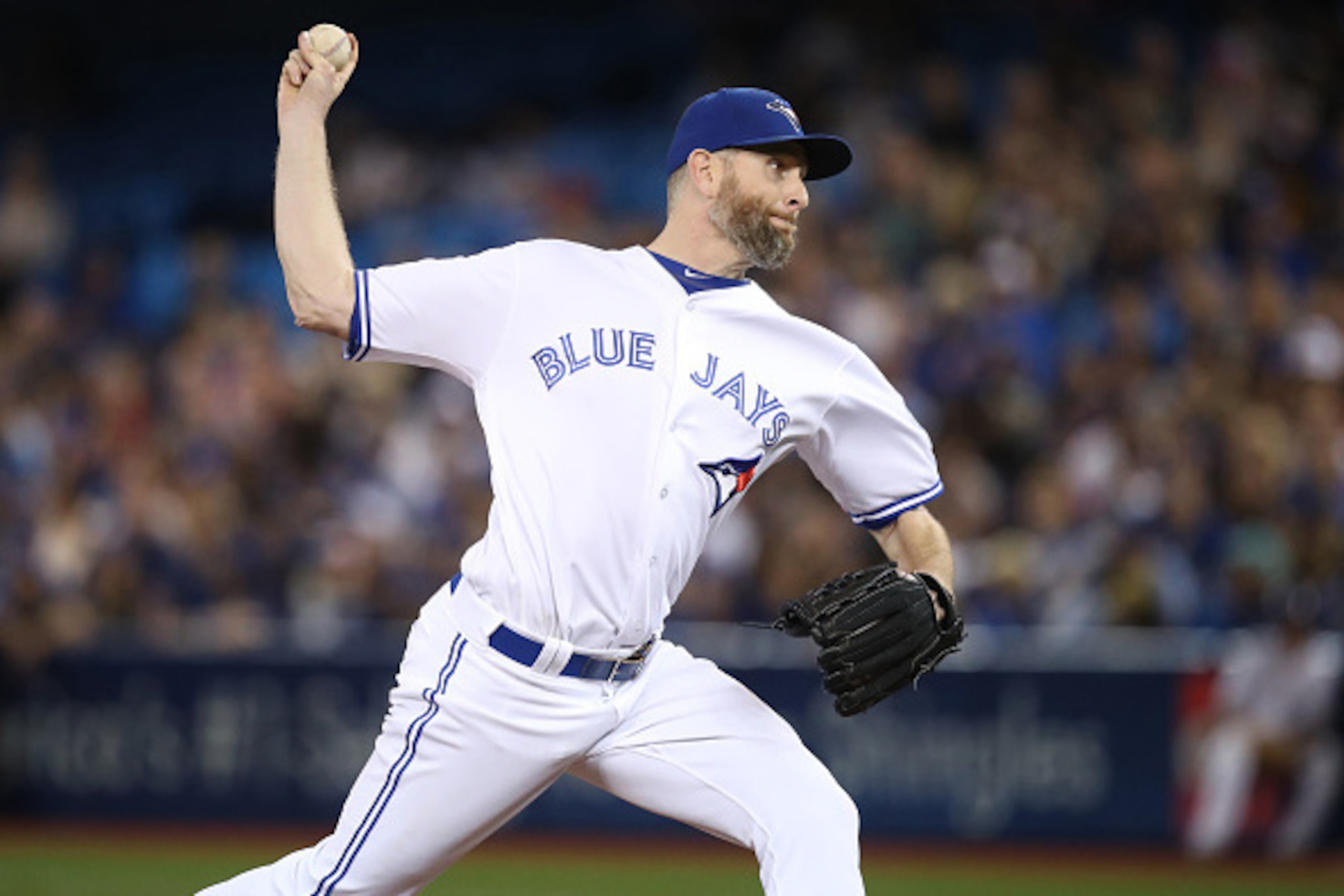 TORONTO, CANADA - SEPTEMBER 13: Scott Feldman #46 of the Toronto Blue Jays delivers a pitch in the ninth inning during MLB game action against the Tampa Bay Rays on September 13, 2016 at Rogers Centre in Toronto, Ontario, Canada. (Photo by Tom Szczerbowsk