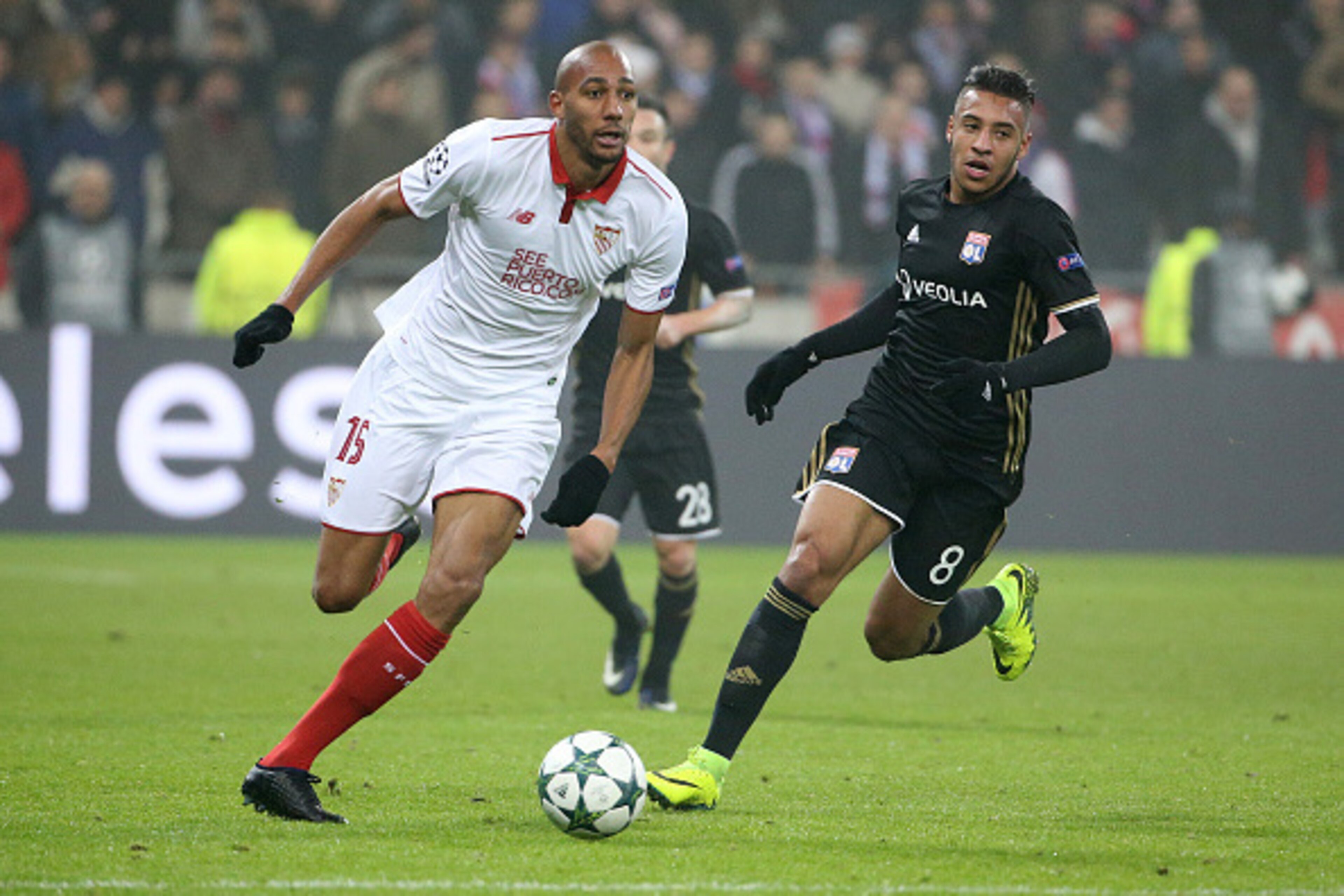 LYON, FRANCE - DECEMBER 7: Steven N'Zonzi of Sevilla FC and Corentin Tolisso of Lyon in action during the UEFA Champions League match between Olympique Lyonnais (OL) and Sevilla FC at Parc OL on December 7, 2016 in Lyon, France. (Photo by Jean Catuffe/Get