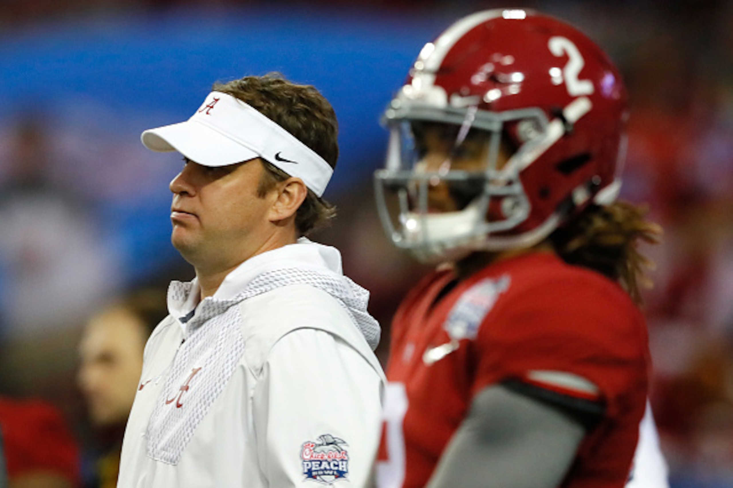 ATLANTA, GA - DECEMBER 31:  Offensive Coordinator Lane Kiffin of the Alabama Crimson Tide and Jalen Hurts #2 of the Alabama Crimson Tide stand durind pre game at  the 2016 Chick-fil-A Peach Bowl at the Georgia Dome on December 31, 2016 in Atlanta, Georgia