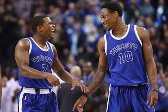 TORONTO, ON - NOVEMBER 12: Kyle Lowry #7 of the Toronto Raptors shares a laugh with DeMar DeRozan #10 during NBA game action against the New York Knicks at Air Canada Centre on November 12, 2016 in Toronto, Canada. NOTE TO USER: User expressly acknowledge