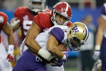 ATLANTA, GA - DECEMBER 31:  Jonathan Allen #93 of the Alabama Crimson Tide tackles Myles Gaskin #9 of the Washington Huskies during the 2016 Chick-fil-A Peach Bowl at the Georgia Dome on December 31, 2016 in Atlanta, Georgia.  (Photo by Kevin C. Cox/Getty