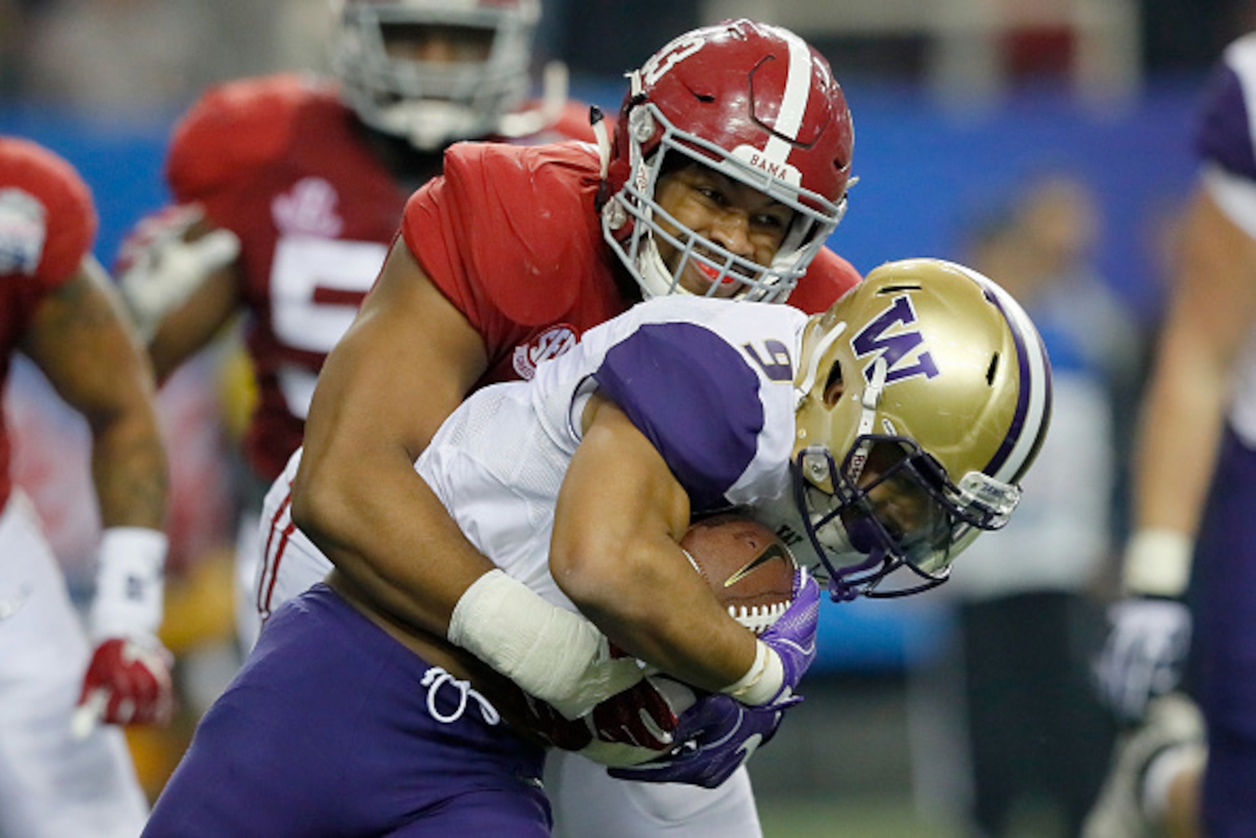 ATLANTA, GA - DECEMBER 31: Jonathan Allen #93 of the Alabama Crimson Tide tackles Myles Gaskin #9 of the Washington Huskies during the 2016 Chick-fil-A Peach Bowl at the Georgia Dome on December 31, 2016 in Atlanta, Georgia. (Photo by Kevin C. Cox/Getty ATLANTA, GA - DECEMBER 31: Jonathan Allen #93 of the Alabama Crimson Tide tackles Myles Gaskin #9 of the Washington Huskies during the 2016 Chick-fil-A Peach Bowl at the Georgia Dome on December 31, 2016 in Atlanta, Georgia. (Photo by Kevin C. Cox/Getty