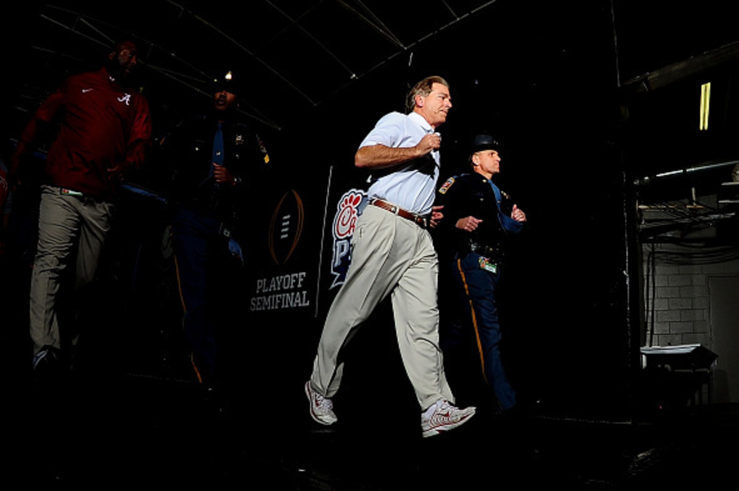 ATLANTA, GA - DECEMBER 31: Head Coach Nick Saban of the Alabama Crimson Tide takes the field against the Washington Huskies during the 2016 Chick-fil-A Peach Bowl at the Georgia Dome on December 31, 2016 in Atlanta, Georgia. (Photo by Scott Cunningham/G ATLANTA, GA - DECEMBER 31: Head Coach Nick Saban of the Alabama Crimson Tide takes the field against the Washington Huskies during the 2016 Chick-fil-A Peach Bowl at the Georgia Dome on December 31, 2016 in Atlanta, Georgia. (Photo by Scott Cunningham/G