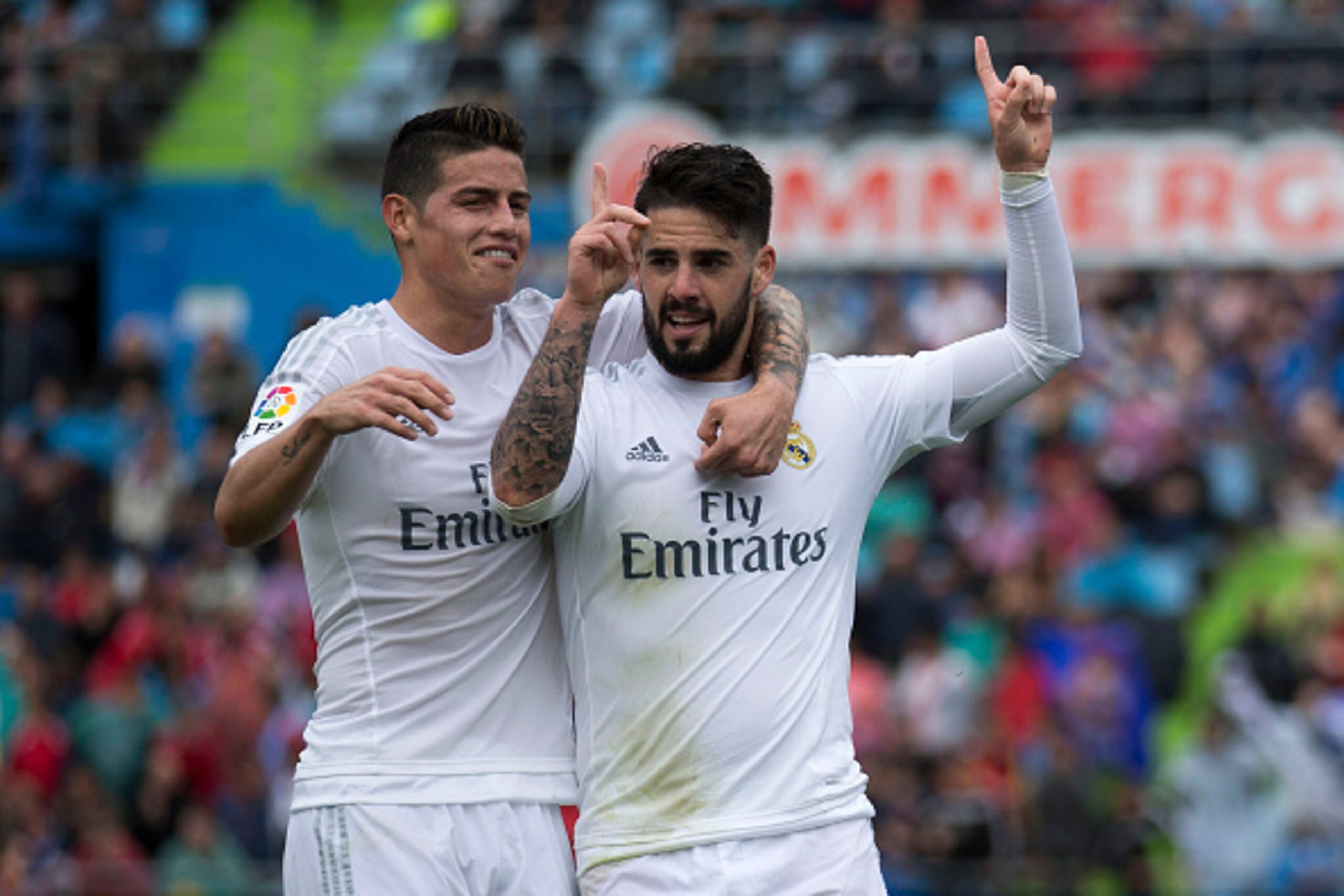 GETAFE, SPAIN - APRIL 16: Francisco Roman Alarcon alias Isco (R) of Real Madrid CF celebrates scoring their second goal with teammate James Rodriguez (L)  during the La Liga match between Getafe CF and Real Madrid CF at Coliseum Alfonso Perez on April 16,