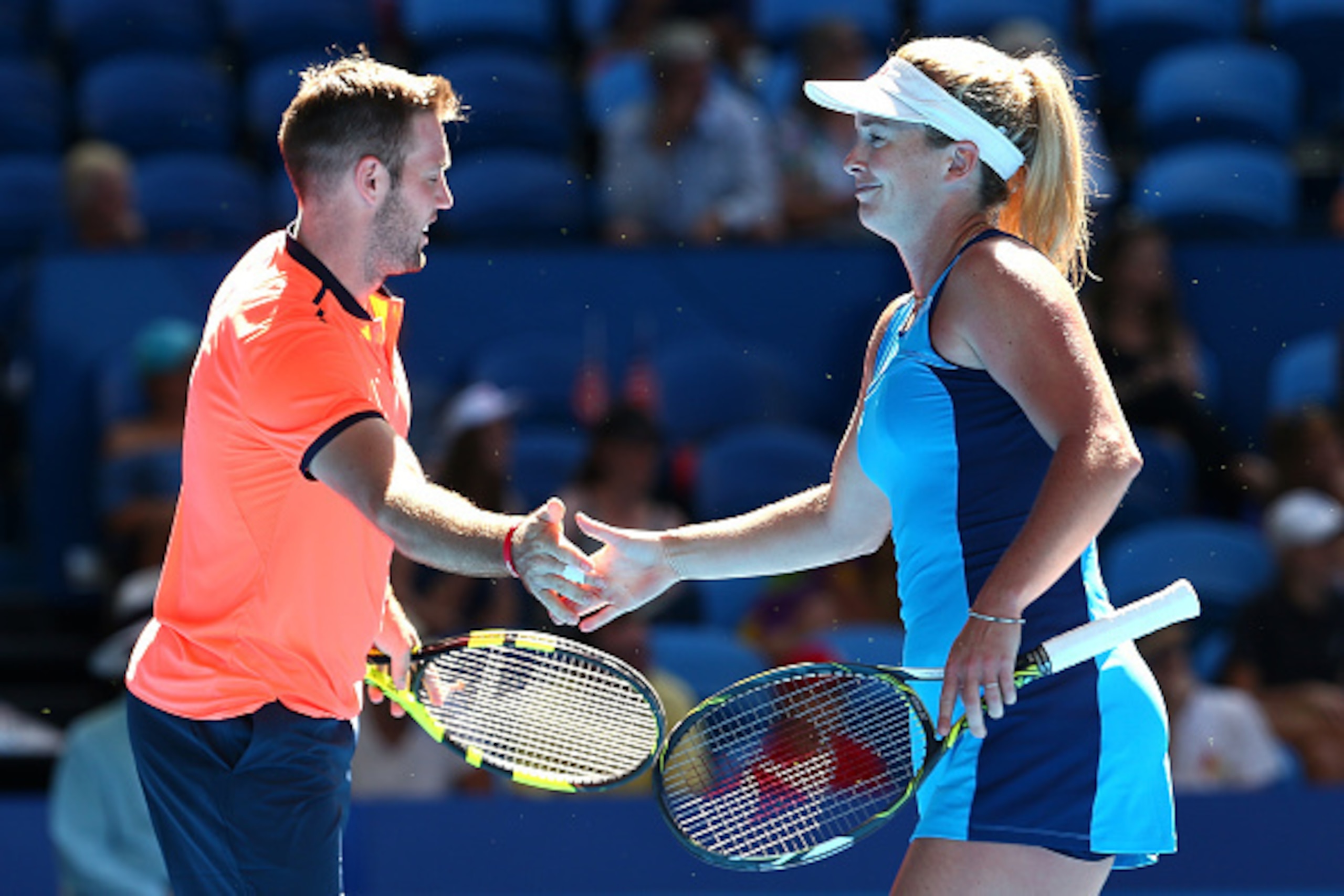 PERTH, AUSTRALIA - JANUARY 03:  Jack Sock and Coco Vandeweghe of the United States celebrate winning a point during the mixed doubles match against Lara Arruabarrena and Feliciano Lopez of Spain on day three of the 2017 Hopman Cup at Perth Arena on Januar