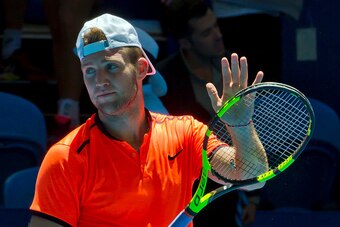 Jack Sock of the US acknowledges the spectators after defeating Adam Pavlasek of the Czech Republic during their first session men's singles match on day one of the Hopman Cup tennis tournament in Perth on January 1, 2017.     / AFP / TONY ASHBY / --IMAGE