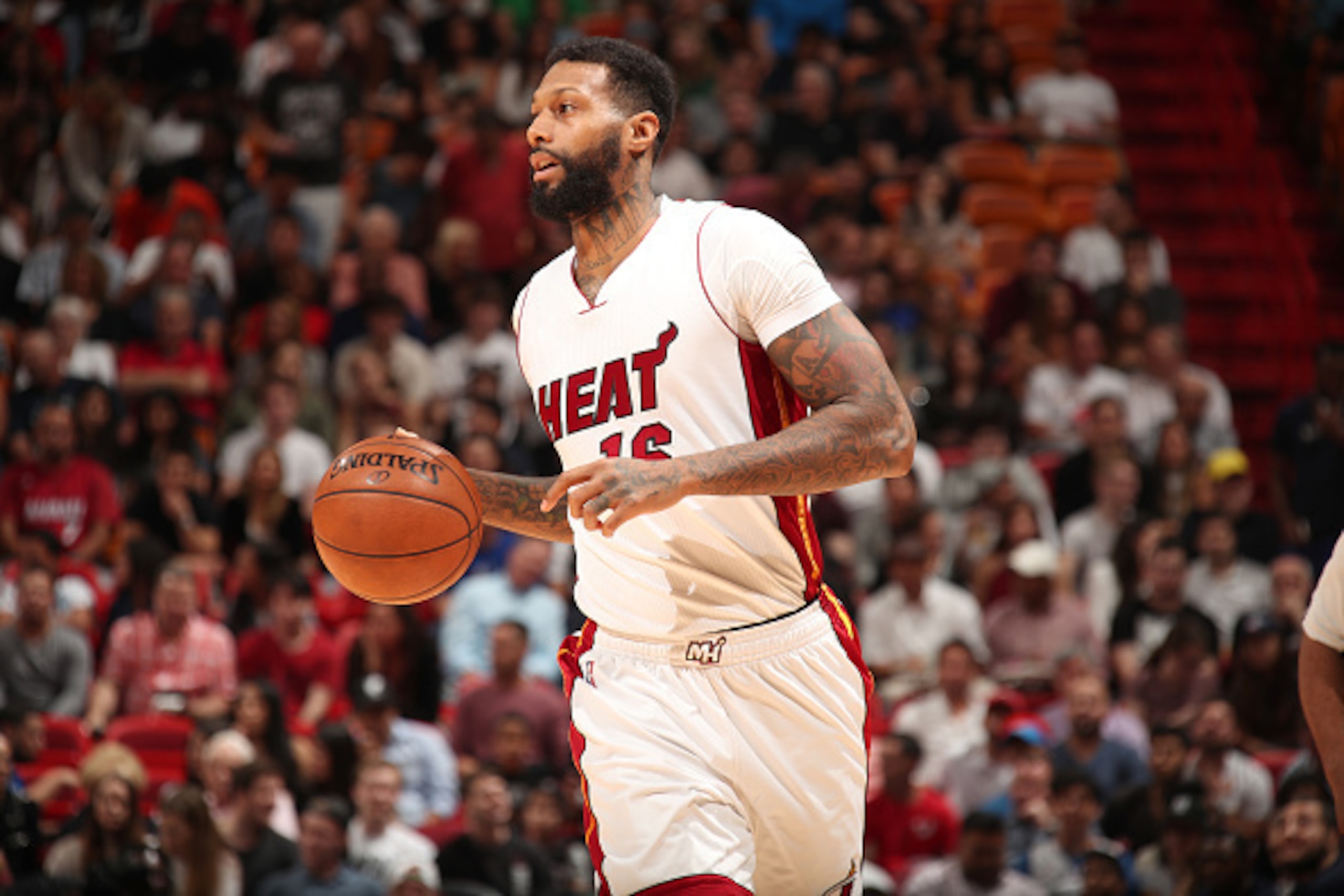 MIAMI, FL - DECEMBER 27: James Johnson #16 of the Miami Heat handles the ball against the Oklahoma City Thunder on December, 2016 at American Airlines Arena in Miami, Florida. NOTE TO USER: User expressly acknowledges and agrees that, by downloading and o