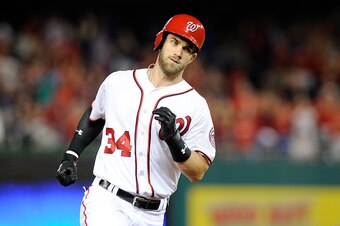 WASHINGTON, DC - SEPTEMBER 10: Bryce Harper #34 of the Washington Nationals rounds the bases after hitting a home run against the Philadelphia Phillies at Nationals Park on September 10, 2016 in Washington, DC. (Photo by G Fiume/Getty Images)