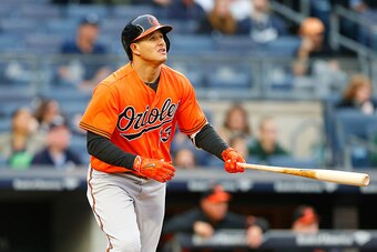 NEW YORK, NY - OCTOBER 01:  Manny Machado #13 of the Baltimore Orioles follows through on a home run against the New York Yankees at Yankee Stadium on October 1, 2016 in the Bronx borough of New York City. The Yankees defeated the Orioles 7-3.  (Photo by 