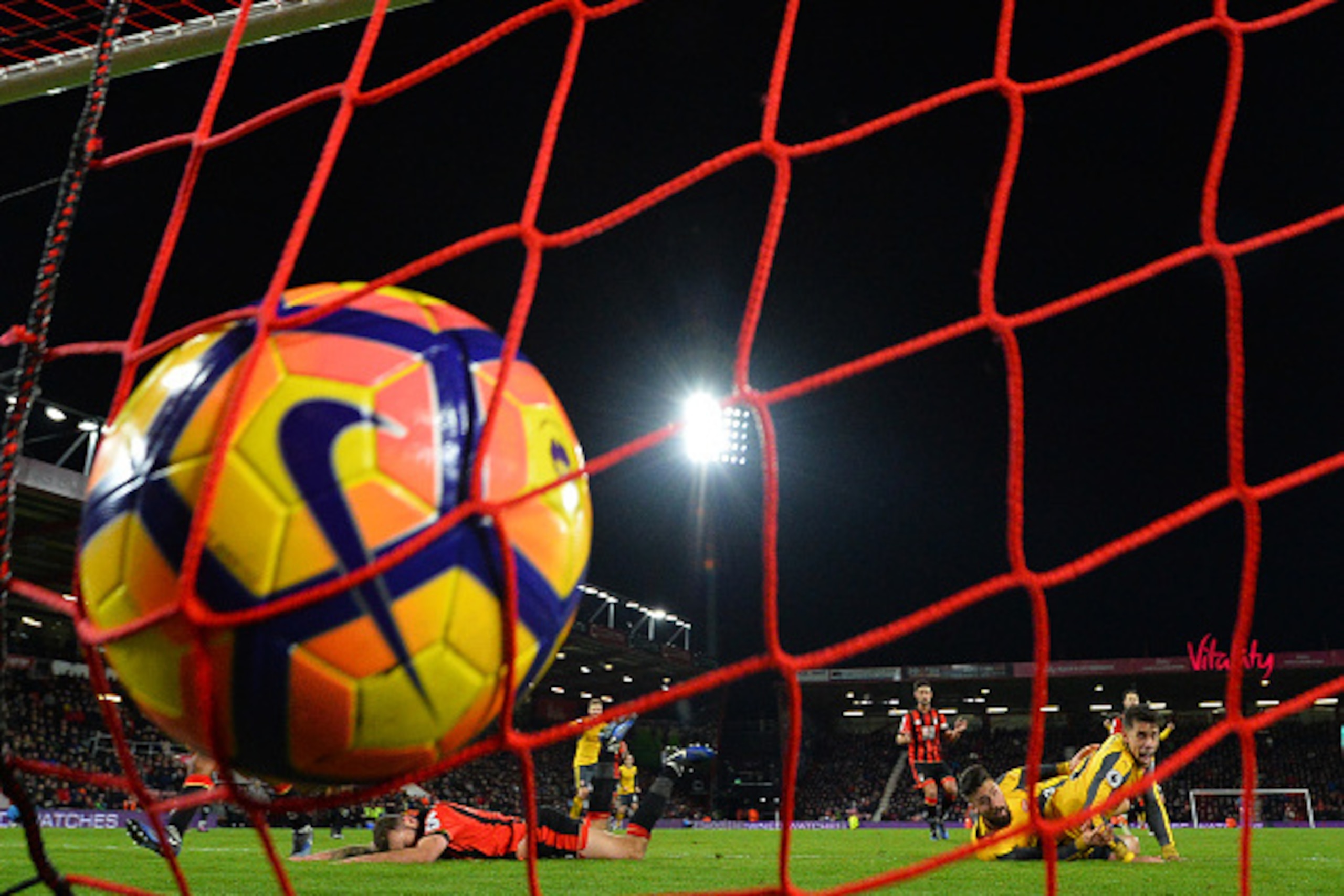 Arsenal's French striker Olivier Giroud (2nd R) watches attempt hit the back of the net as Arsenal make it 3-3 during the English Premier League football match between Bournemouth and Arsenal at the Vitality Stadium in Bournemouth, southern England on Jan Arsenal's French striker Olivier Giroud (2nd R) watches attempt hit the back of the net as Arsenal make it 3-3 during the English Premier League football match between Bournemouth and Arsenal at the Vitality Stadium in Bournemouth, southern England on Jan