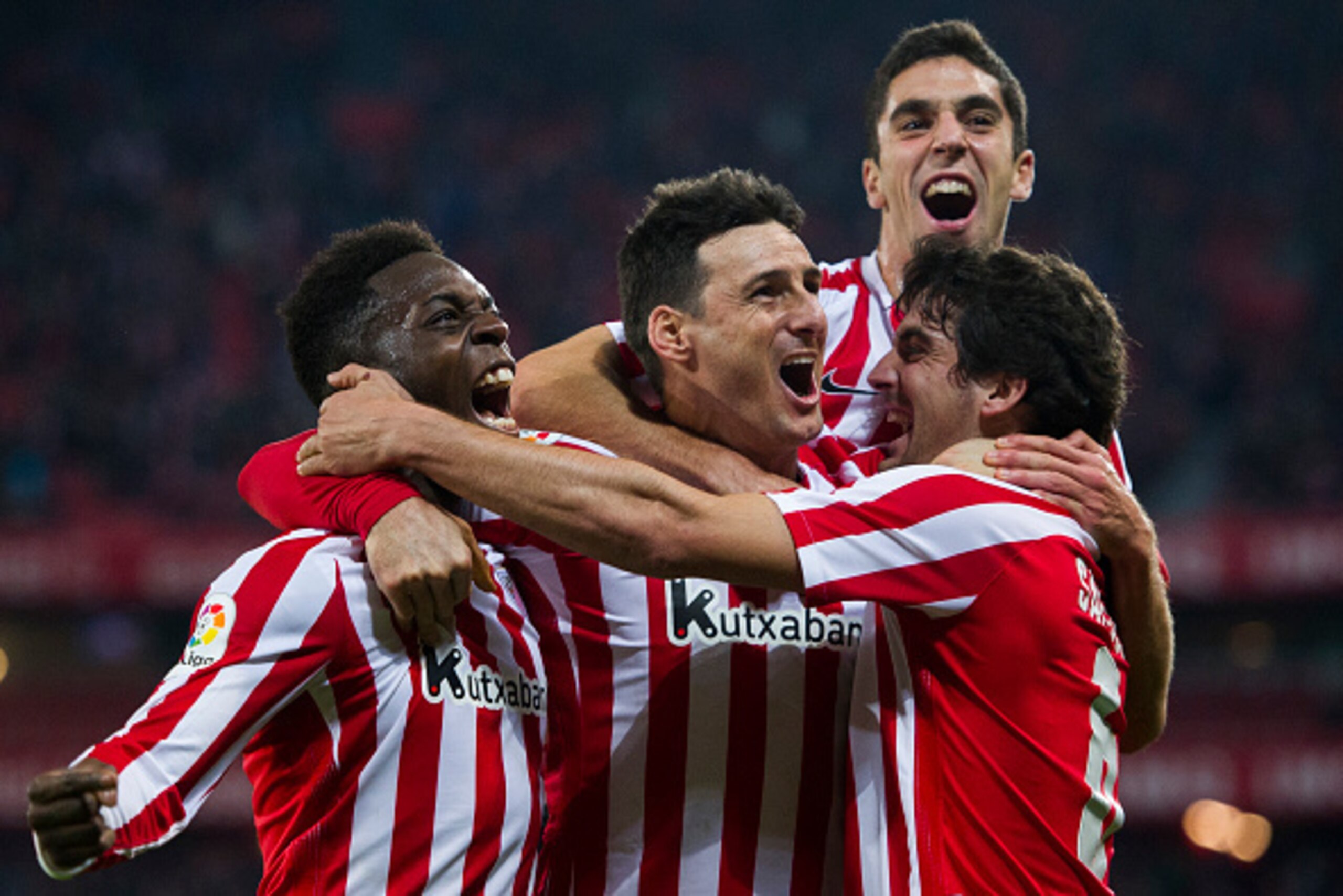 BILBAO, SPAIN - DECEMBER 19:  Mikel San Jose of Athletic Club celebrates with his teammates Sabin Marino, Aritz Aduriz and Inaki Willams of Athletic Club after scoring his team's second goal during the La Liga match between Athletic Club Bilbao and RC Cel