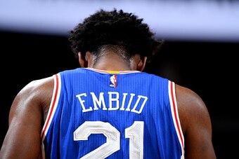 DENVER, CO - DECEMBER 30: Joel Embiid #21 of the Philadelphia 76ers looks on during the game against the Denver Nuggets on December 30, 2016 at the Pepsi Center in Denver, Colorado. NOTE TO USER: User expressly acknowledges and agrees that, by downloading
