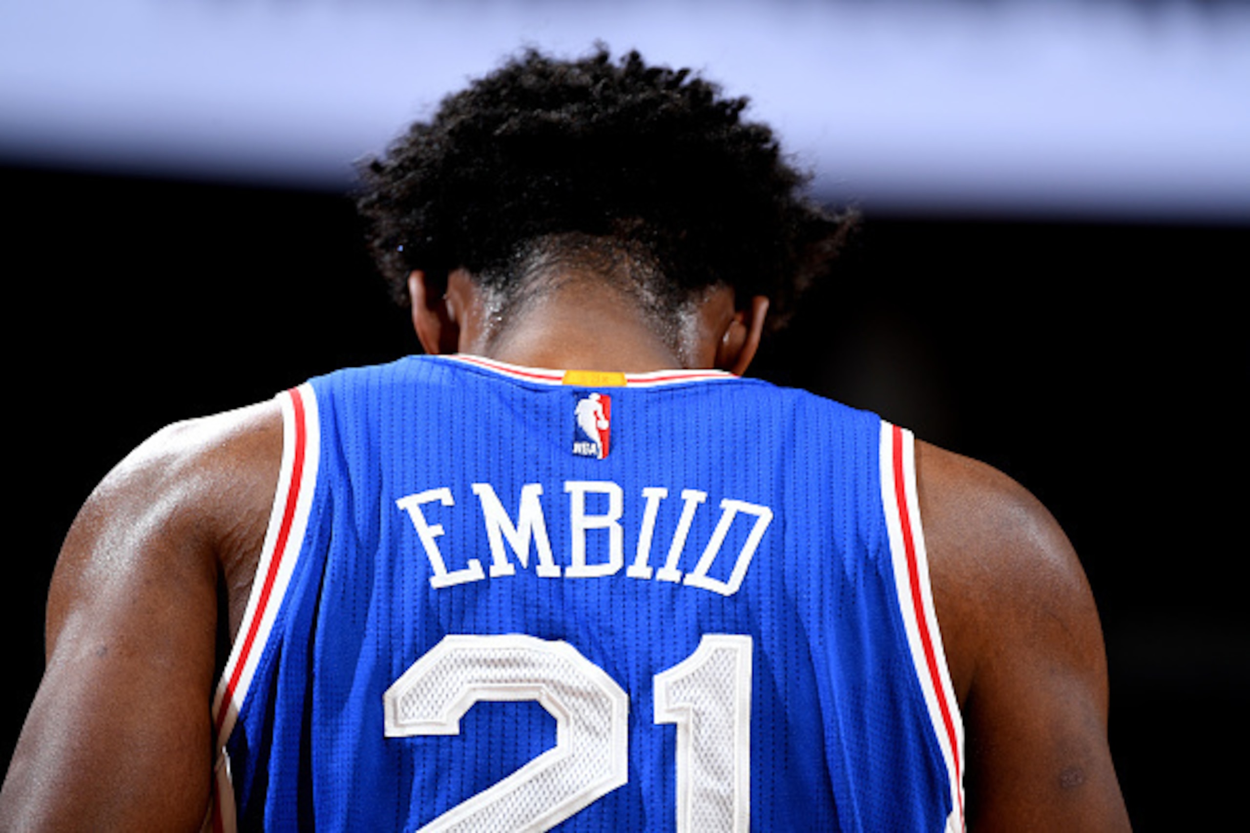 DENVER, CO - DECEMBER 30: Joel Embiid #21 of the Philadelphia 76ers looks on during the game against the Denver Nuggets on December 30, 2016 at the Pepsi Center in Denver, Colorado. NOTE TO USER: User expressly acknowledges and agrees that, by downloading
