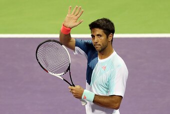 Spain's Fernando Verdasco celebrates after winning against Belgium's David Goffin during the second round of the ATP Qatar Open tennis competition in Doha on January 4, 2017. / AFP / KARIM JAAFAR        (Photo credit should read KARIM JAAFAR/AFP/Getty Ima