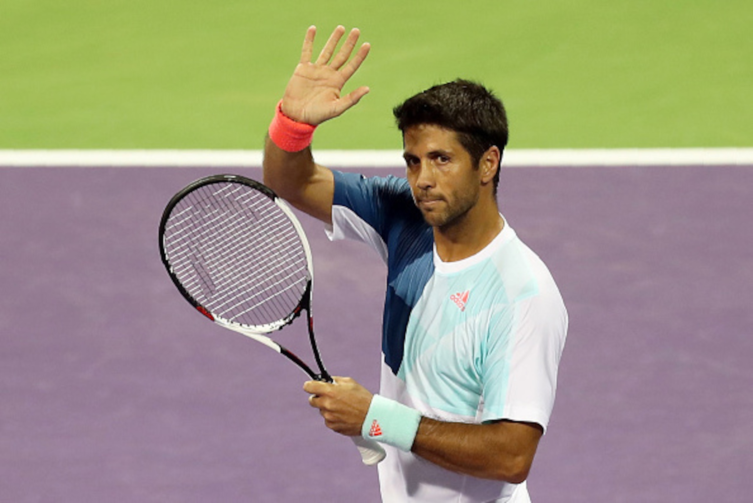 Spain's Fernando Verdasco celebrates after winning against Belgium's David Goffin during the second round of the ATP Qatar Open tennis competition in Doha on January 4, 2017. / AFP / KARIM JAAFAR        (Photo credit should read KARIM JAAFAR/AFP/Getty Ima