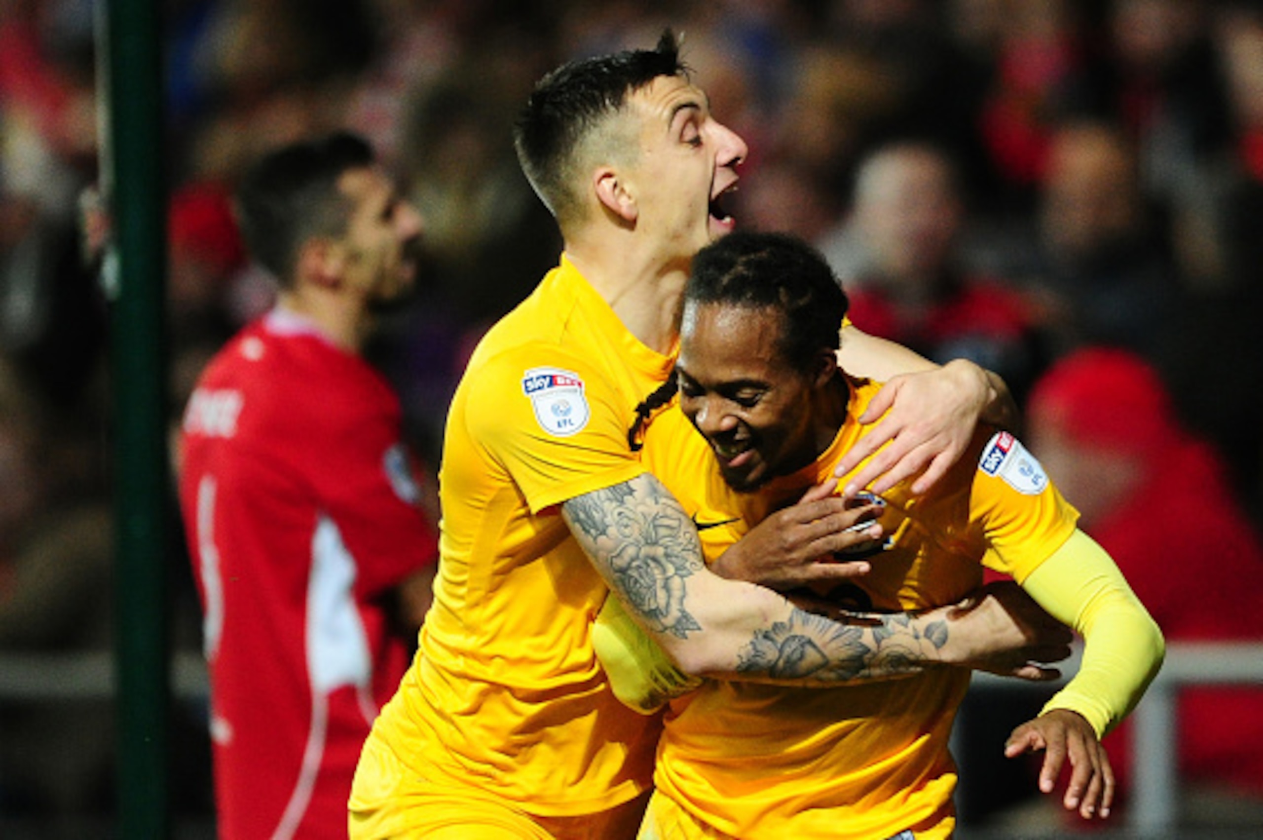 BRISTOL, UNITED KINGDOM - DECEMBER 17: Daniel Johnson of Preston North End (R) celebrates his sides goal during the sky Bet Championship match between Bristol City and Preston North End at Ashton Gate on December 17 2016 in Bristol, England. (Photo by Har