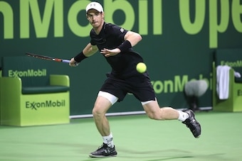 Britain's Andy Murray returns the ball to Austria's Gerald Melzer during the second round of the ATP Qatar Open tennis competition in Doha on January 4, 2017. / AFP / KARIM JAAFAR        (Photo credit should read KARIM JAAFAR/AFP/Getty Images)
